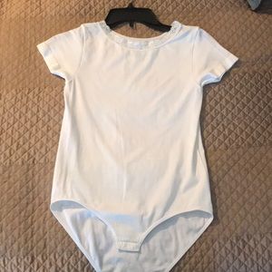 White short sleeve bodysuit.